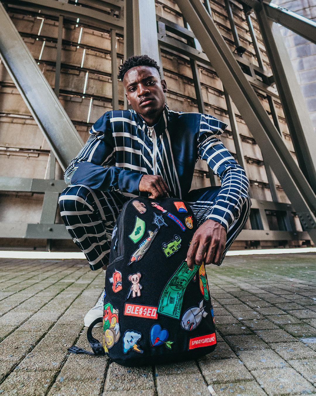 THE 32 REMOVABLE PATCHES VELCRO BACKPACK