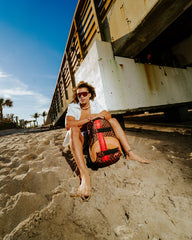 HENNY VICTORY LAP SKATEBOARD-STRAP BACKPACK